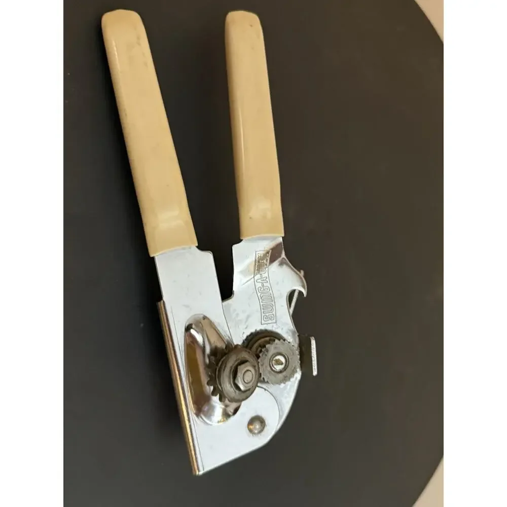 Swing Away Can Opener Ivory Rubber Grips Stainless Steel Made In USA Very Clean